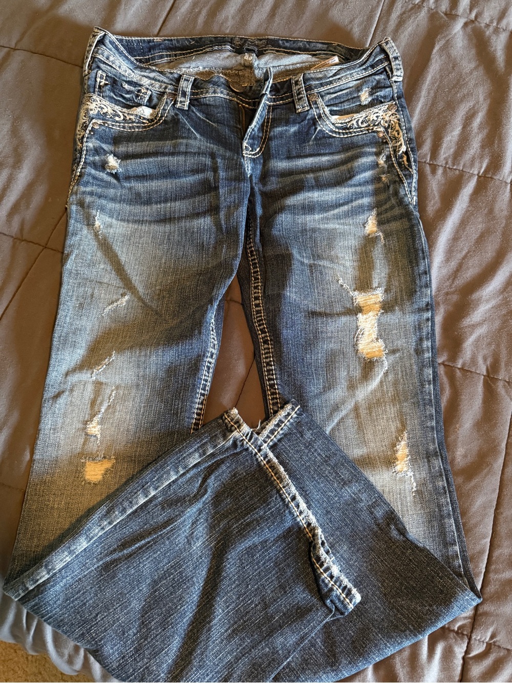 Women’s Distressed Dark Blue Bootcut Jeans